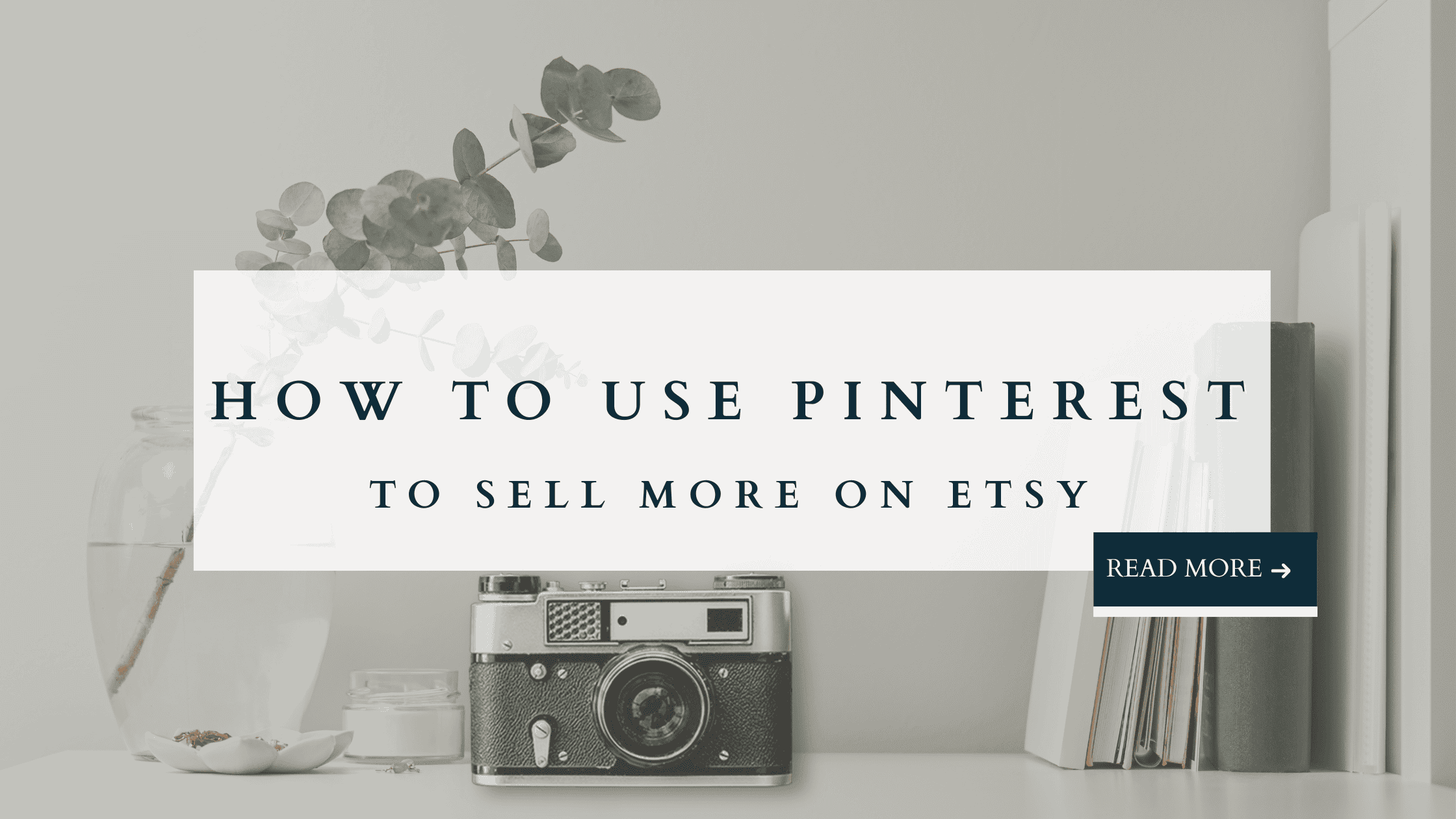 Featured blog graphic with vintage camera and books on a desk, text overlay reads “How to Use Pinterest to Sell More on Etsy.”